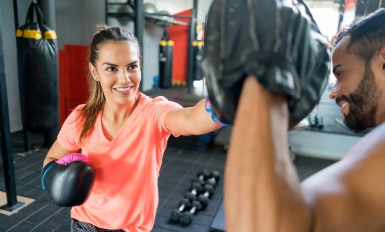 boy-and-girl-using-boxing-equipment