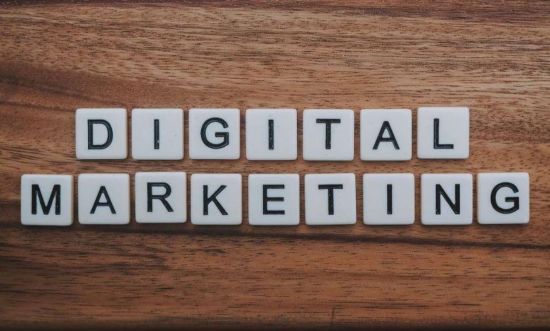 A picture shows tiles written digital marketing on them. digital marketing agency